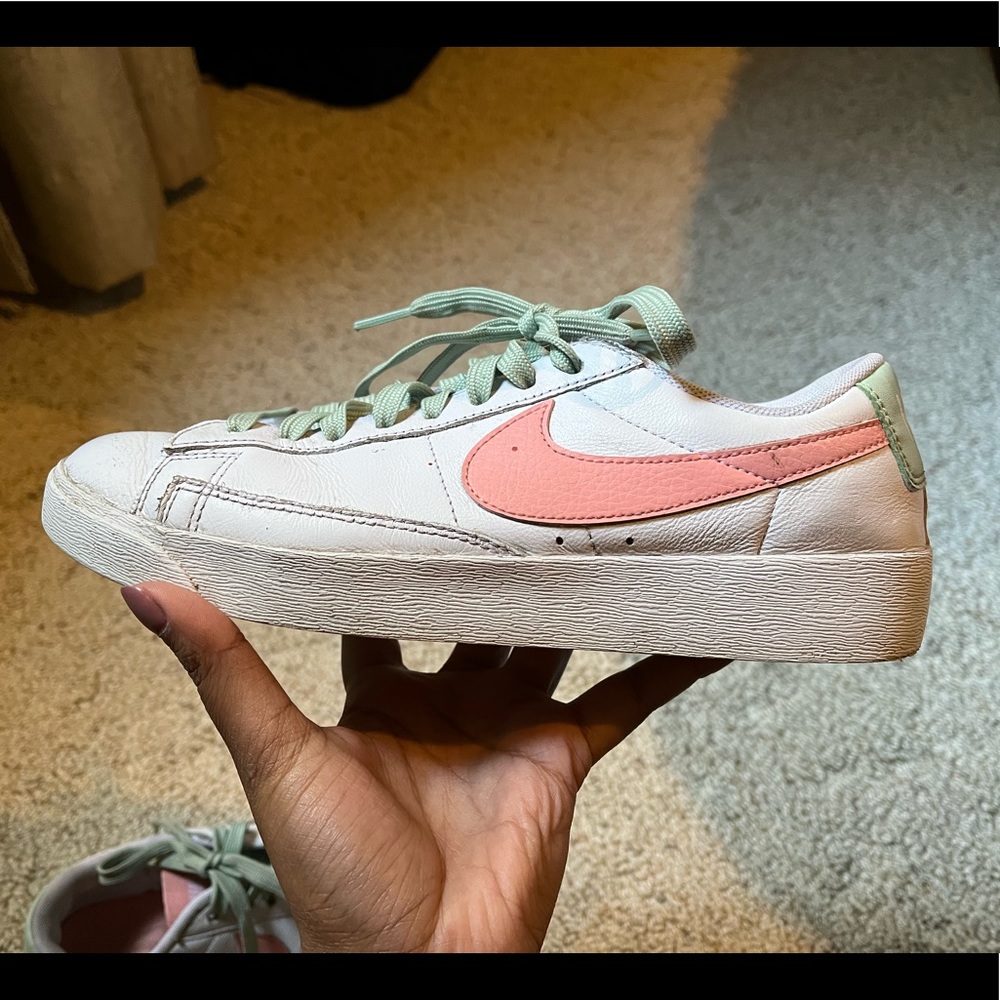 Green and pink Nike Cortez sneakers